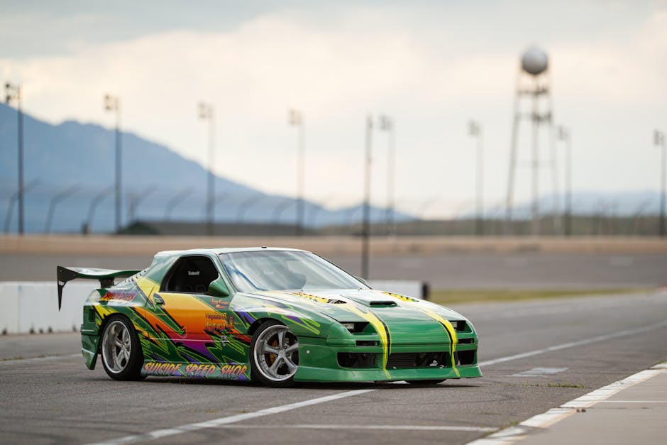 Green race car representing agility
